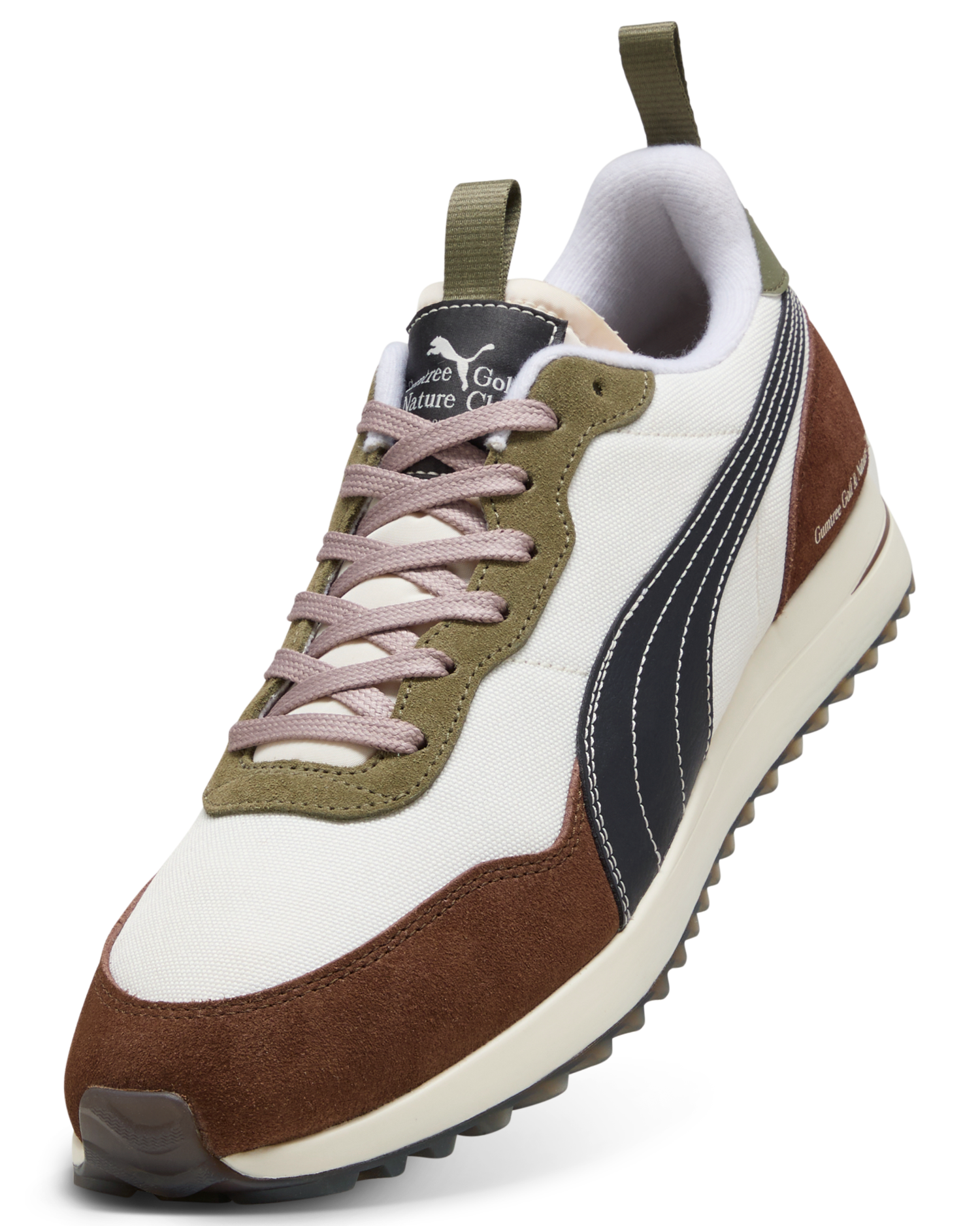 Multicolored sneaker with brown, green, and white accents on a white background