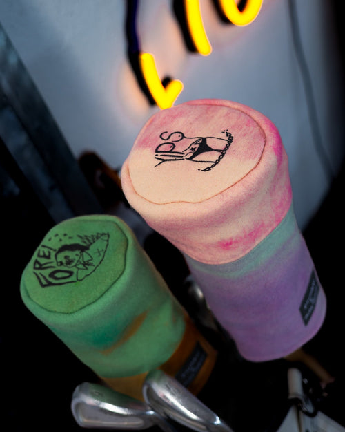 Two colorful markers with unique designs on a blurred background