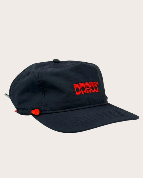 Navy cap with red logo on a white background
