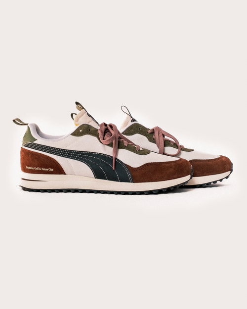 Multicolored sneakers on a light beige background